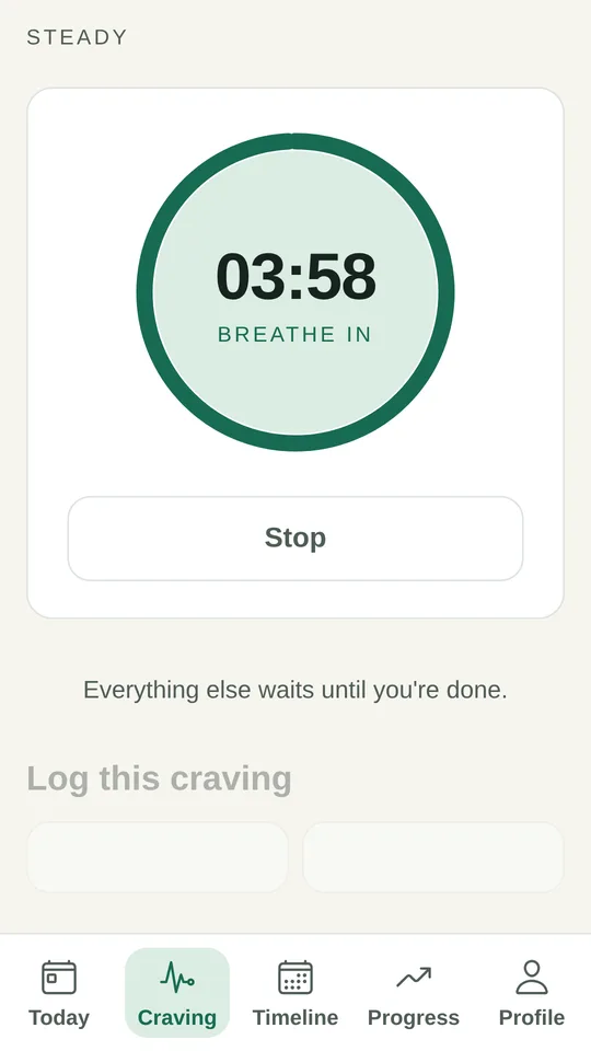 Craving timer counting down from four minutes with a breathe-in prompt